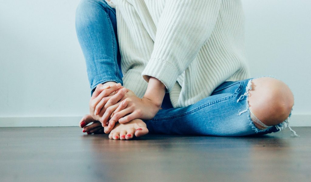Girl sat on floor